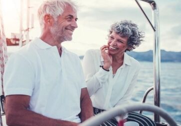 Couple enjoying evening boat ride