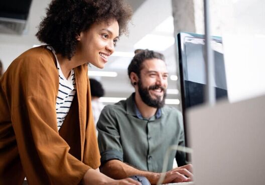 Happy workers consider their 401k benefits and how to maximize them