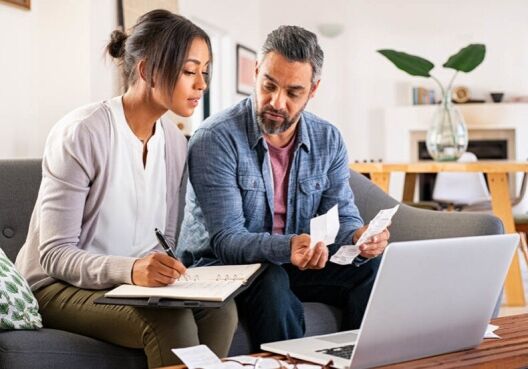 Couple works on making a budget