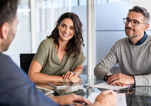 mature couple learns the importance of asset location from financial advisor