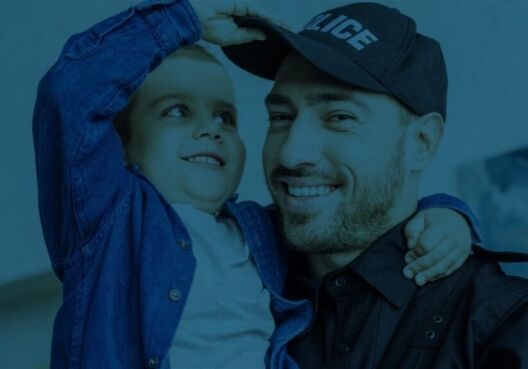 Policeman holding child
